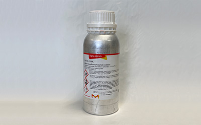 The image displays a metallic silver bottle with a white screw-on cap, positioned vertically on a smooth white surface. The bottle features a prominent label that includes the brand name "Sigma-Aldrich" in red, along with detailed information about the contents, which include a lithium hexafluorophosphate solution. The label contains safety symbols in black and red, indicating hazards such as flammability and toxicity. The text on the label is printed in both English and other languages, providing instructions and safety information. The background is a bright white, enhancing the visibility of the bottle and its label, which serves as a focal point for understanding its purpose in liquid electrolyte research and development. The image displays a metallic silver bottle with a white screw-on cap, positioned vertically on a smooth white surface. The bottle features a prominent label that includes the brand name "Sigma-Aldrich" in red, along with detailed information about the contents, which include a lithium hexafluorophosphate solution. The label contains safety symbols in black and red, indicating hazards such as flammability and toxicity. The text on the label is printed in both English and other languages, providing instructions and safety information. The background is a bright white, enhancing the visibility of the bottle and its label, which serves as a focal point for understanding its purpose in liquid electrolyte research and development.