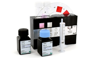 Color-disk Comparator with Reagents and sample in multiple black color bottles and white label in its front. 