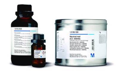 Two containers of chemical substances, one a small brown bottle and the other a larger metal can, both labeled with scientific information. Two containers of chemical substances, one a small brown bottle and the other a larger metal can, both labeled with scientific information.