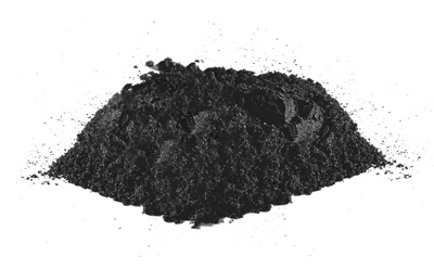 A pile of fine black powder representing activated carbon adsorbent. The material has a granular, slightly uneven texture, and appears dry and porous.