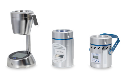 Three MAS-100® portable microbial air samplers displayed on a white surface. MAS-100® Sirius to the left, MAS-100 VF® in the middle, and MAS-100 Eco® to the right.