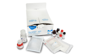 PyroMAT<sup>®</sup> system Open white box labeled PyroMAT Kit Pyrogen Detection Assay, with small bottles, vials, and a 96-well plate set of reagents arranged around it.
