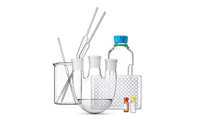 DWK Life Sciences Glassware and Products Image showing various pieces of laboratory glassware including a beaker holding burettes, two vials, a round bottom flask, a bottle, and a 96-well plate.