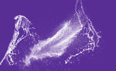 White splash on purple background with powder and liquid areas representing the solubility-enhancement effect of meglumine.