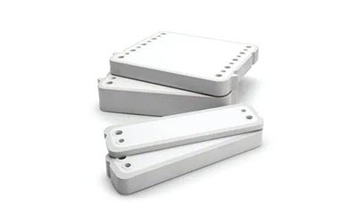 Pellicon 3 cassette stack with flat rectangular modules on a plain white background.