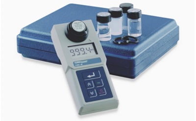 Turbidimeter with vials of liquid and a carrying case. Turbidimeter with vials of liquid and a carrying case.