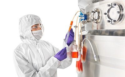 NovaSeptum<sup>®</sup> GO sterile sampling system Operator taking sterile samples with NovaSeptum® GO sterile sampling system in a stainless-steel bioreactor