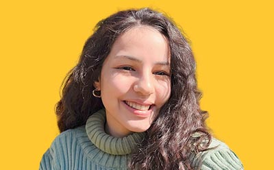 Nisan Irem Cetingök Headshot of Nisan Irem Cetingök with yellow background