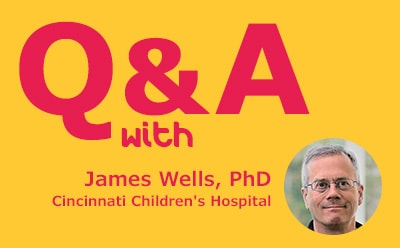 Article: Q&A with James Wells, PhD, Cincinnati Children's Hospital Yellow background with title: "Q&A with James Wells, PhD, Cincinnati Children's Hospital, in the right corner at the bottom a headshot of James Wells.