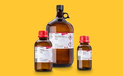 Products and Services Three Sigma-Aldrich® glas bottles on yellow background.