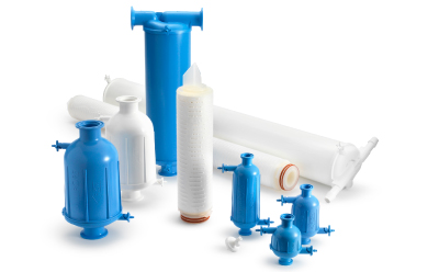 Bacterial retention testing Blue and white laboratory equipment, including pumps, filters, vessels, and fittings, displayed against a white background.