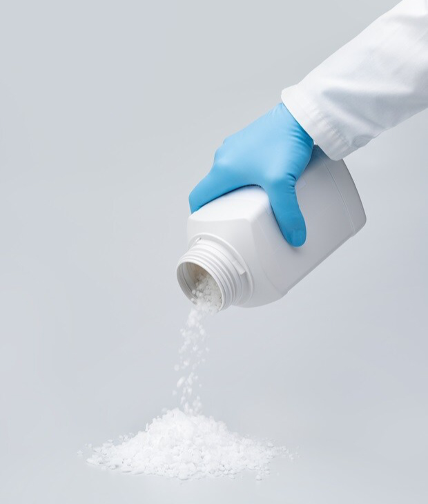Visual comparison of free-flowing granulated salt and caked powdered salt under laboratory handling conditions. Visual comparison of free-flowing granulated salt and caked powdered salt under laboratory handling conditions.