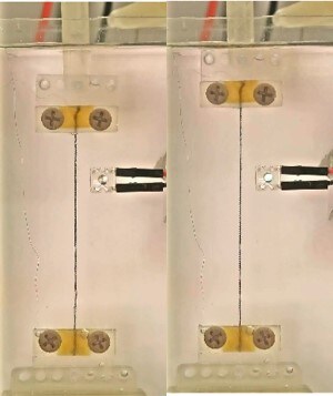 An LED light in the external circuit lit up by stretching a coiled CNT yarn inside an electrolyte, boosting the voltage