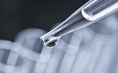 Pipette with water drop for genomic analysis