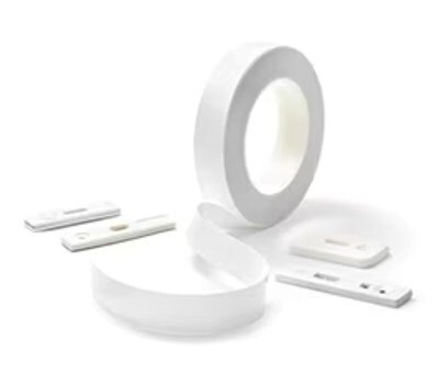 photo of lateral flow test devices and roll of membrane used as component