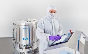 A photo of an Operator setting up a mixer