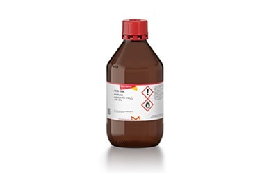  The image is of a a brown plastic bottle with a red cap and a white label, which contains Acetone.