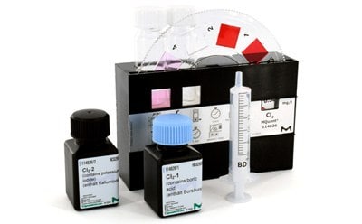 Color-disk Comparator with Reagents and sample in a beaker.