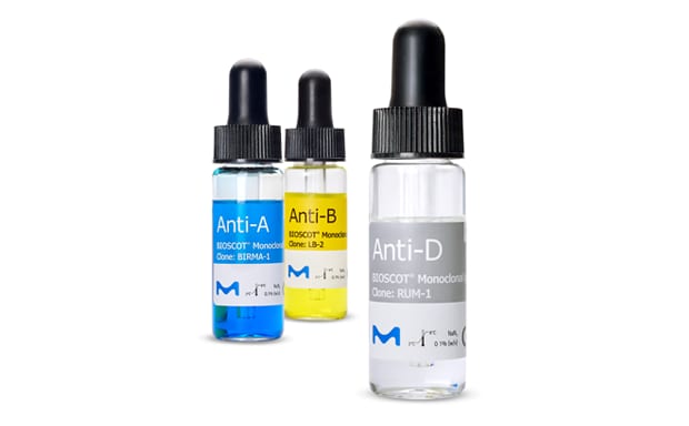 Blood Typing Finished Reagents-Vials Three bottles of monoclonal antibodies labeled Anti-A, Anti-B, and Anti-D, each in different colored solutions (blue, yellow, and clear) with black droppers on top. The labels include the product names and clone information.