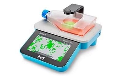  A modern digital laboratory scale with a blue base and a touchscreen interface. 