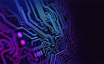 Image of integrated circuit with electronic components made from electronic chemicals highlighted in blue and purple