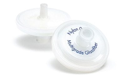 GFF Millex<sup>®</sup> syringe filter Zoomed photograph of two 33 mm Millex<sup>®</sup> syringe filters with glass fiber filter