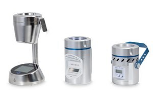 Three MAS-100® portable microbial air samplers displayed on a white surface. MAS-100® Sirius to the left, MAS-100 VF® in the middle, and MAS-100 Eco® to the right.