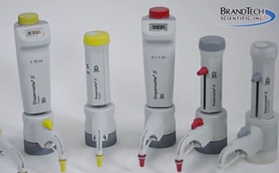 Bottle-top dispensers for liquid dispensing