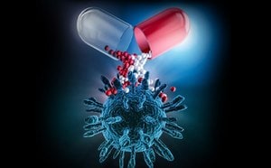 Illustration of a capsule releasing small drug particles toward a biological target structure.