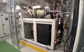 Laboratory fume hood and equipment in a lab workspace, representing lab ventilation and HVAC optimization for energy efficiency.