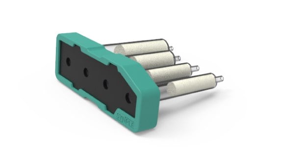Teal Synple silyl deprotection cartridge with a black core panel and four connected reaction vials.
