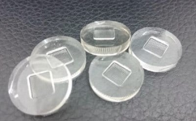 Microneedle template featuring a 10×10 array with uniform needle height and pyramidal geometry for controlled microneedle fabrication.