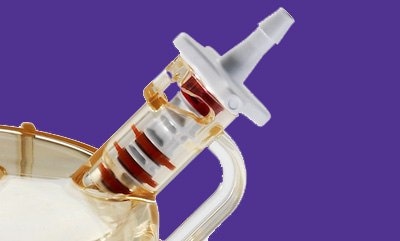 Filter port called an AMPP, made of clear polymer which contains 3 O-rings. When the port is open the O-rings create an aseptic area between the environment and flow path.