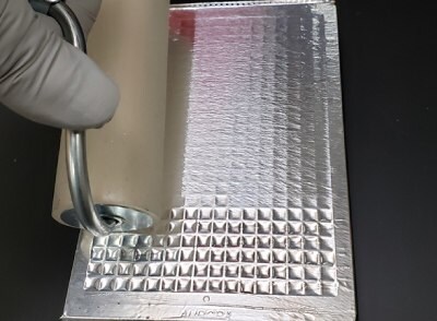 Image of the aluminum adhesive seal needed for SMC® assay plates read on FemtoQuest™ instruments. Do NOT use clear acrylic seals to seal loaded read plates because they do not protect against light.